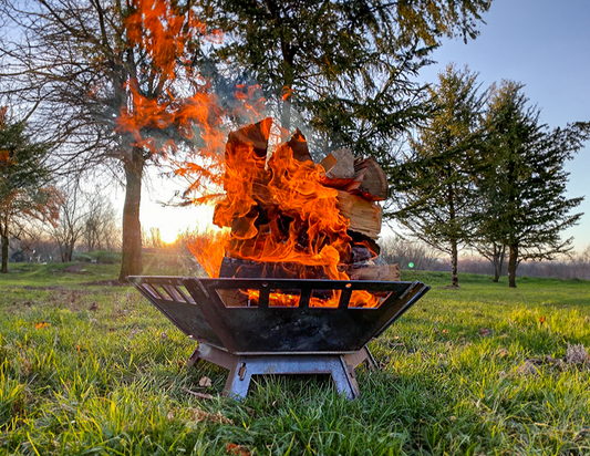 Collapsible Fire Pit with big fire burning inside